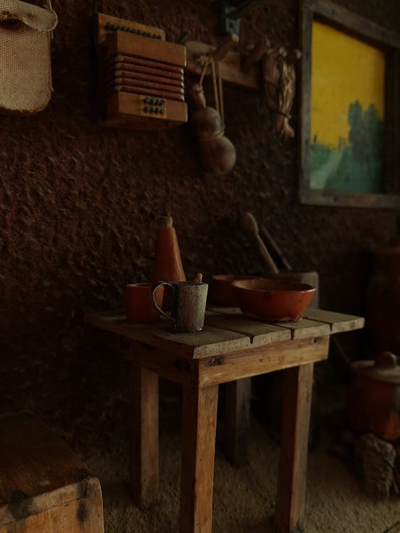 Old Tableware on Wooden Table in Kitchen