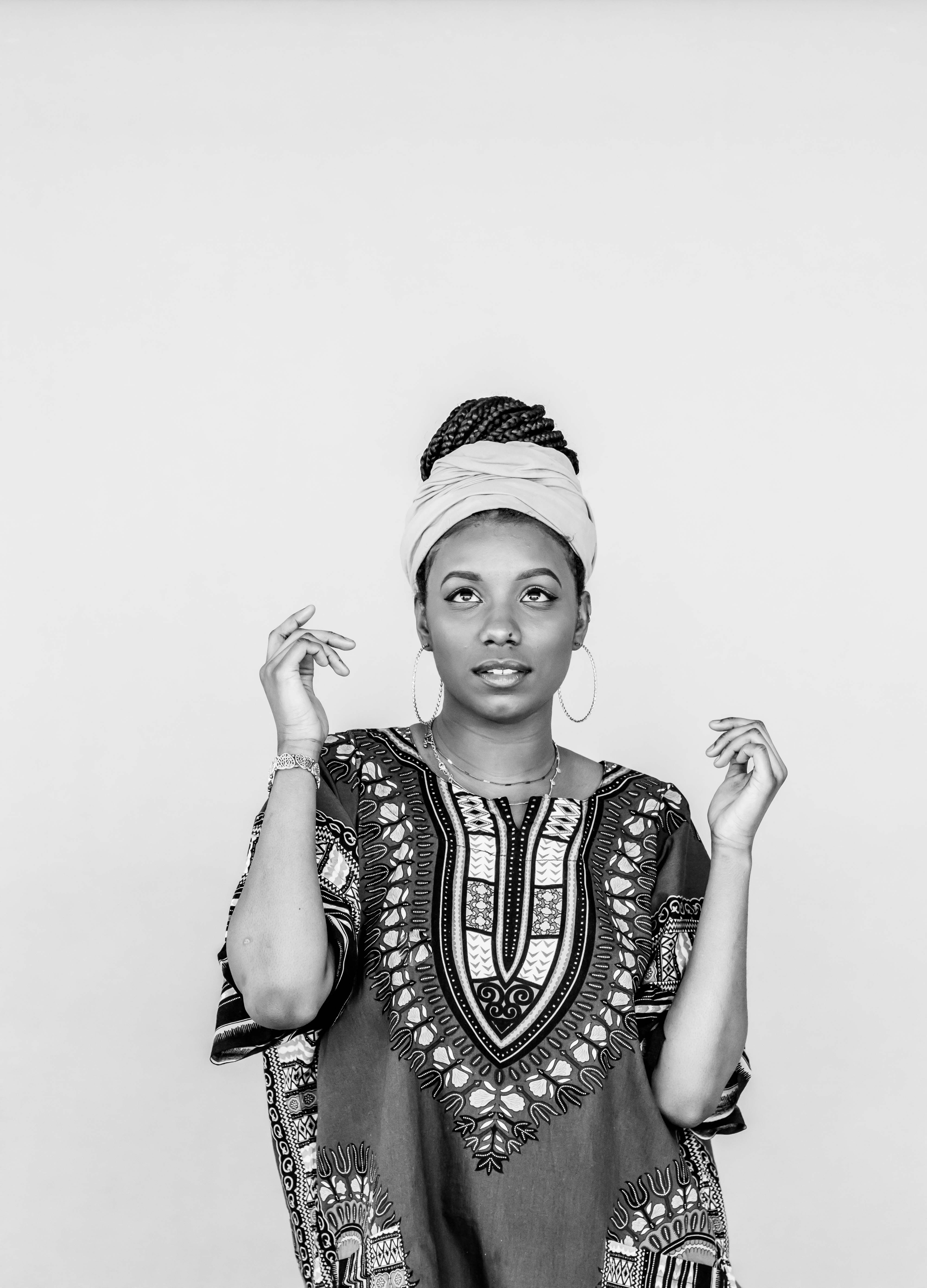 Studio Portrait of a Young Woman Wearing Traditional Clothing · Free ...