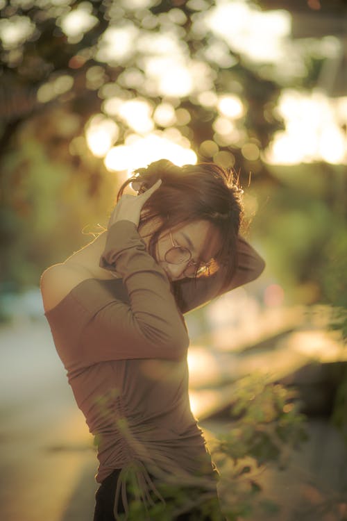 Free Woman Posing Among Trees in Autumn  Stock Photo