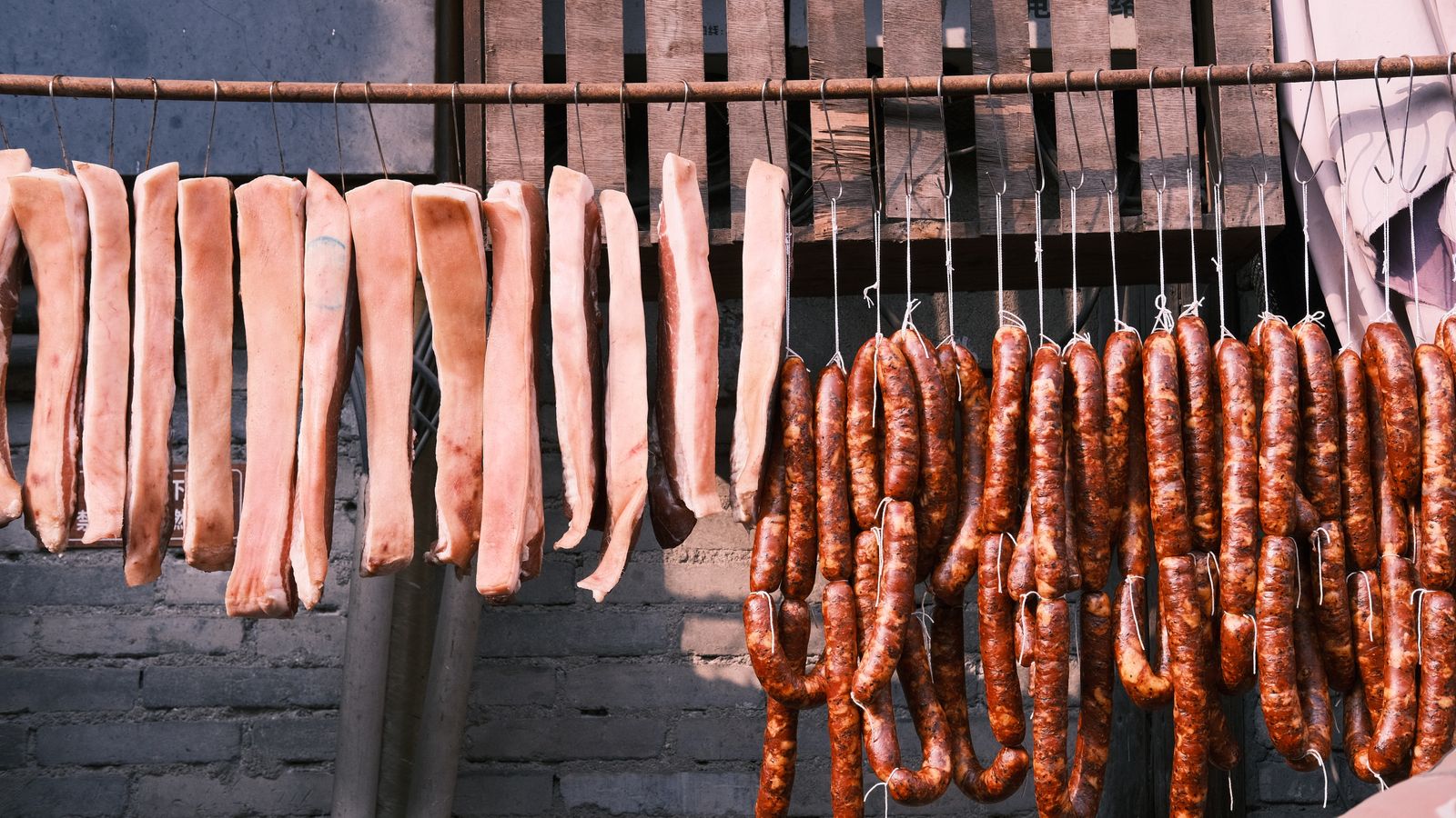 Meat hanging off a bar, Niger