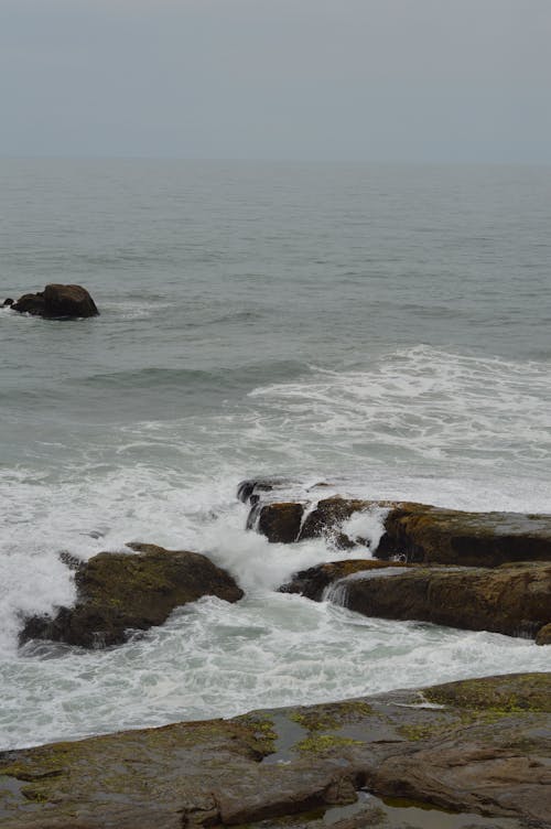 Waves Crashing Into Rocks