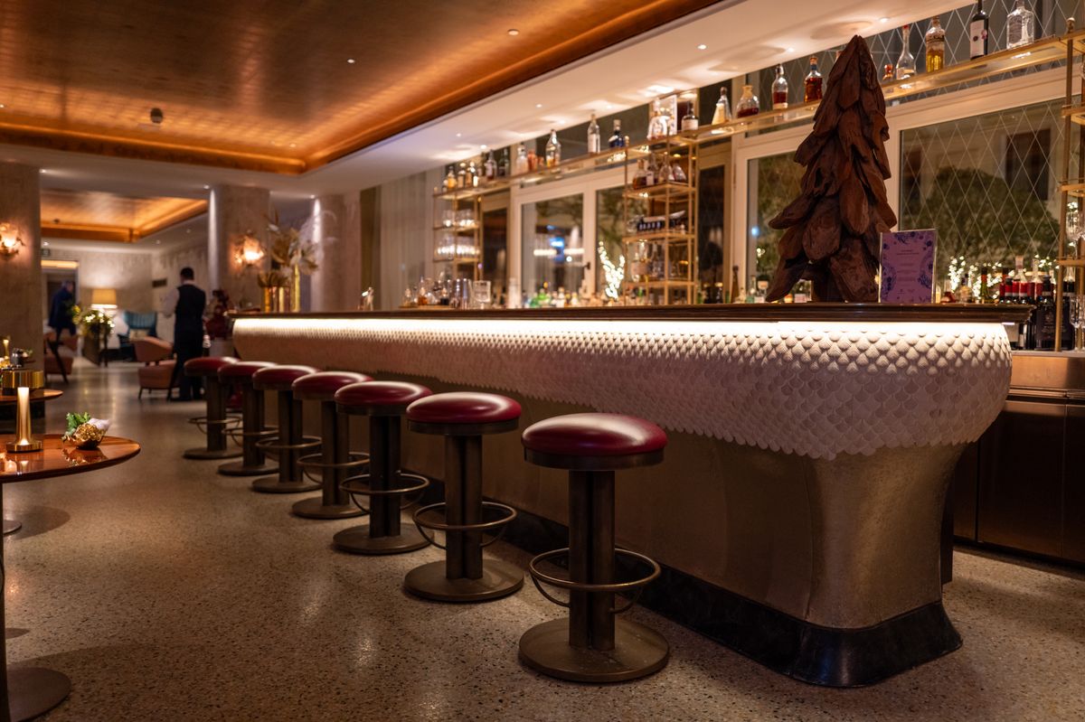 Gold Room bar with elegant seating and brass accents