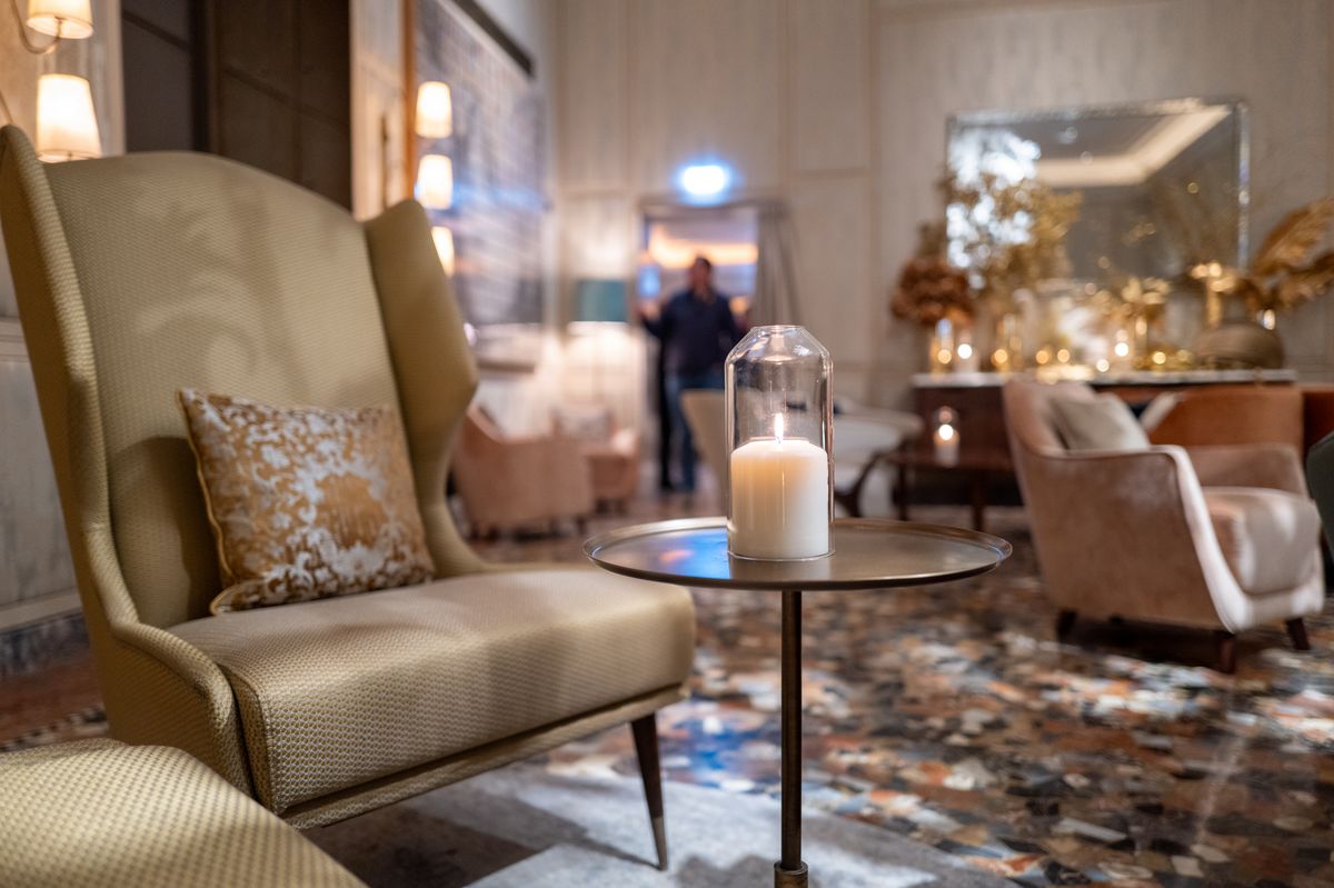 Elegant lounge with luxurious armchairs and ambient lighting