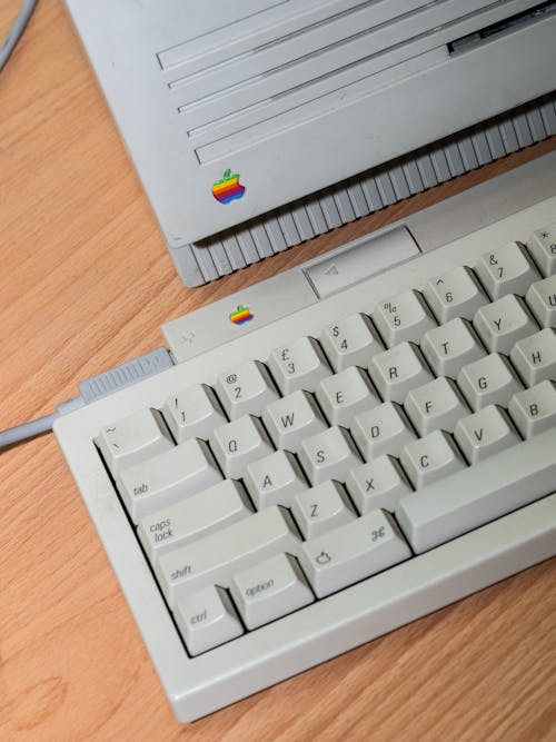 Free Close-up Photo of a Gray Keyboard of an Apple Desktop Computer Stock Photo