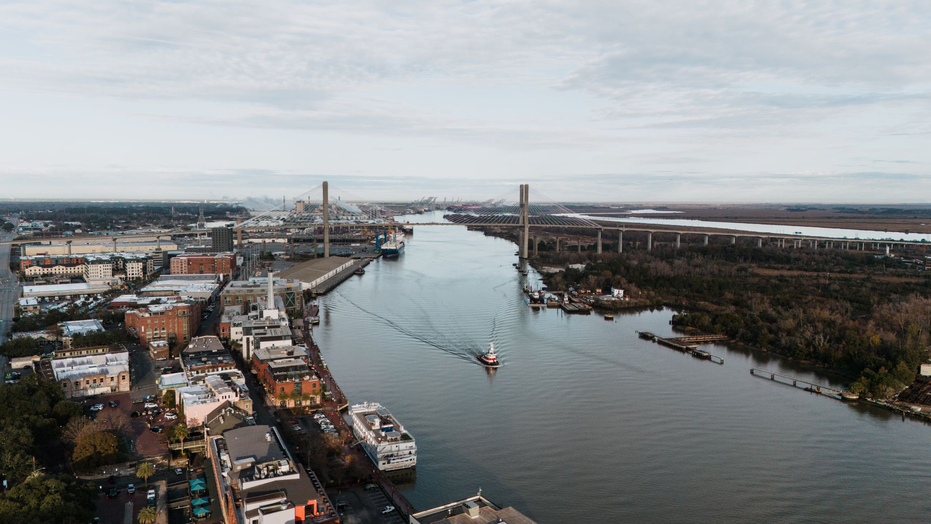 Scenic aerial view of Savannah River and Talmadge Memorial Bridge in Georgia, USA.