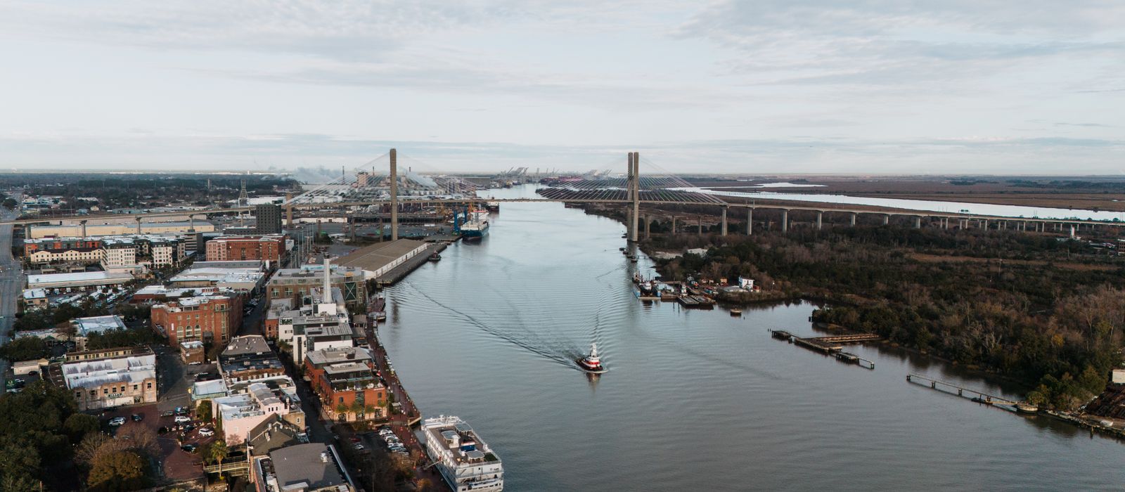 Scenic aerial view of Savannah River and Talmadge Memorial Bridge in Georgia, USA.
