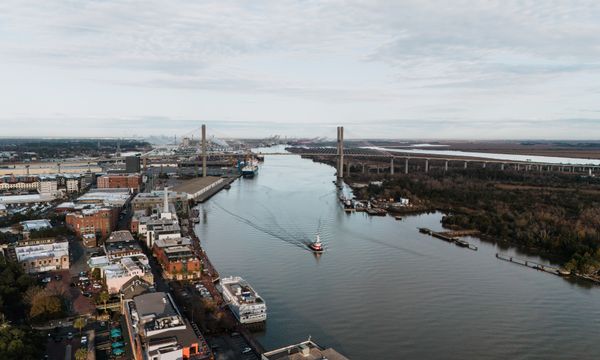 Scenic aerial view of Savannah River and Talmadge Memorial Bridge in Georgia, USA.