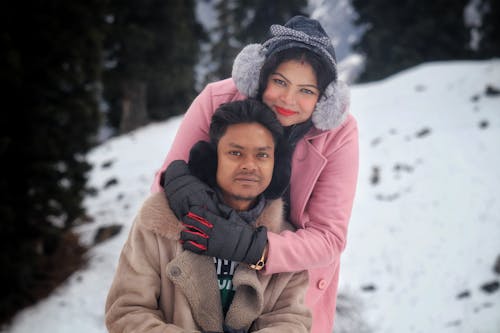 A Couple Embracing in Winter 