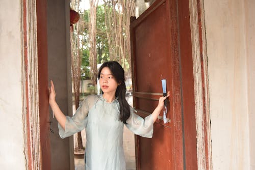 A Young Woman Posing in Doors