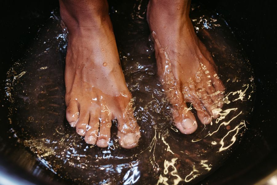 Feet soaking in water