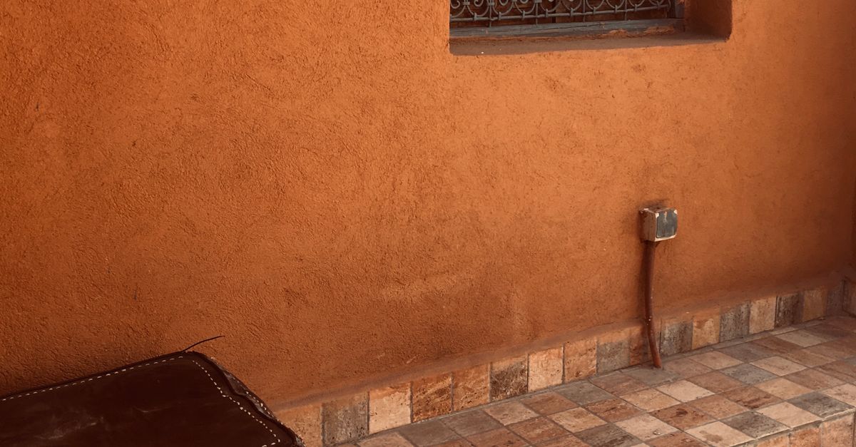 Natural leather ottoman