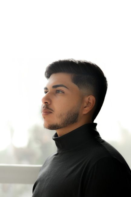 Elegant portrait of a man in a black turtleneck, Sete Lagoas, Brazil.