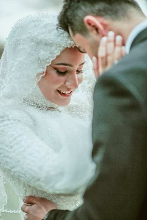 Smiling Newlyweds Standing Together