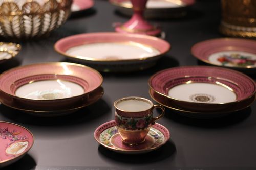 Free Delicate porcelain tableware with intricate floral designs on display. Stock Photo