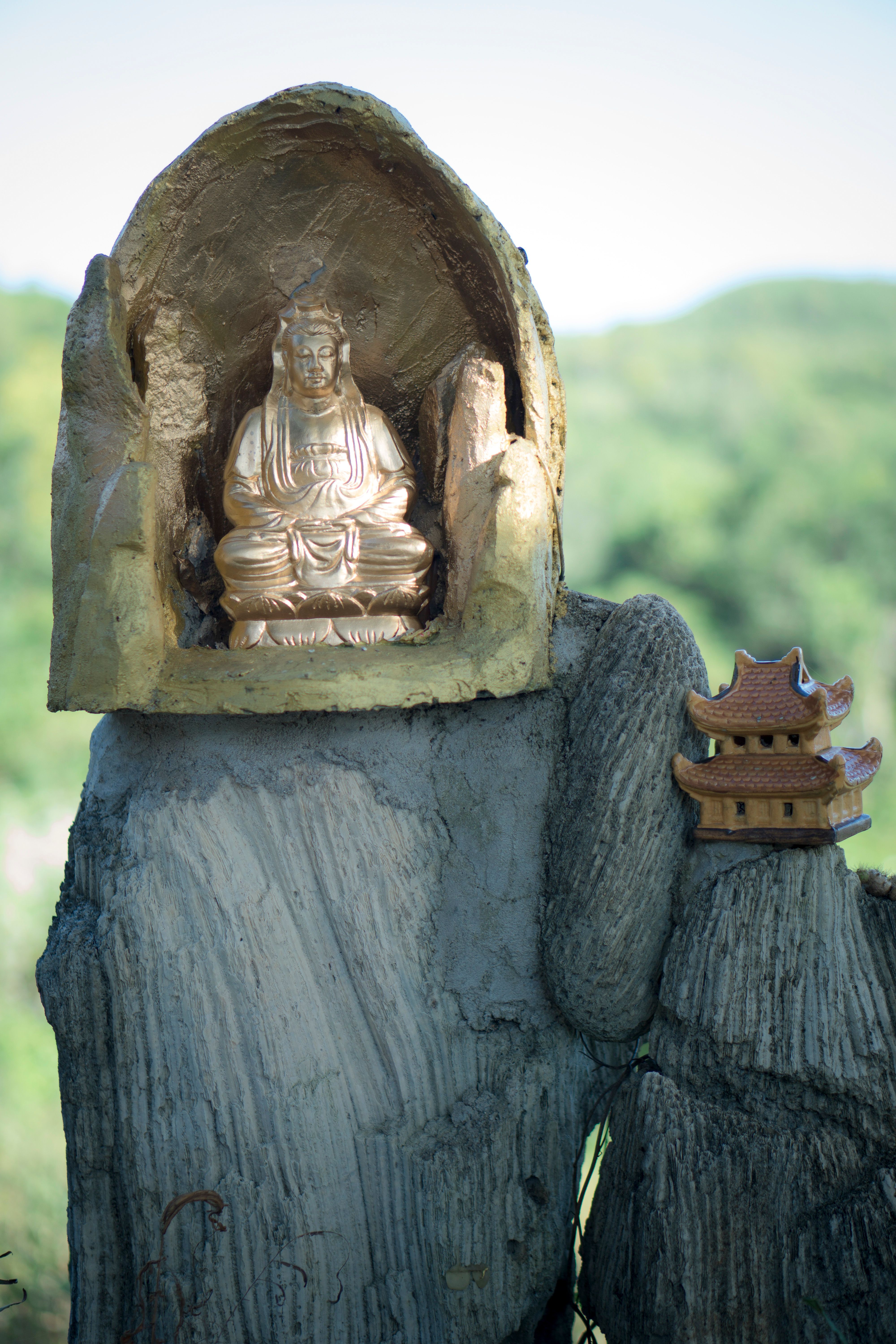 Buddhist Statues on Rocks · Free Stock Photo