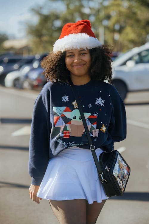 Smiling Woman in Santa Hat