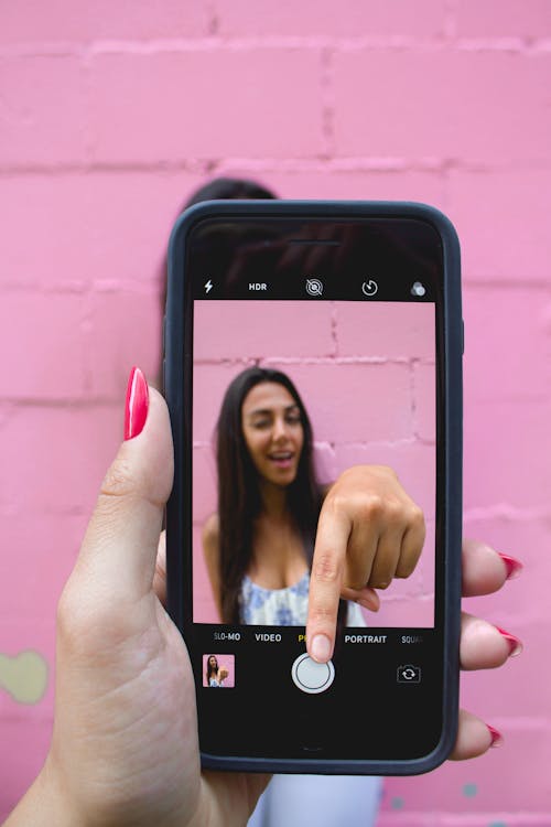 Foto De Persona Sosteniendo Un I Phone