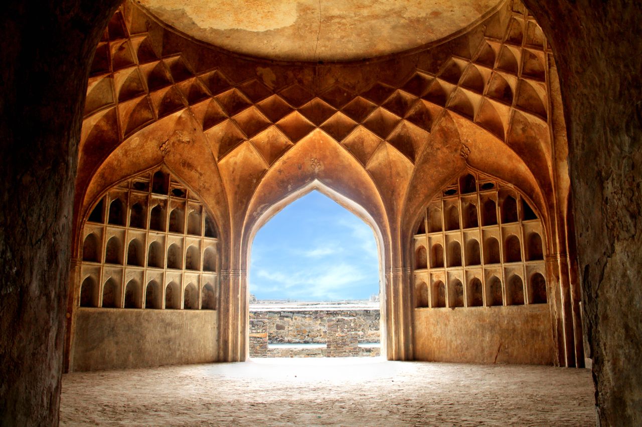 explore the grand gothic arches inside golconda fort showcasing intric