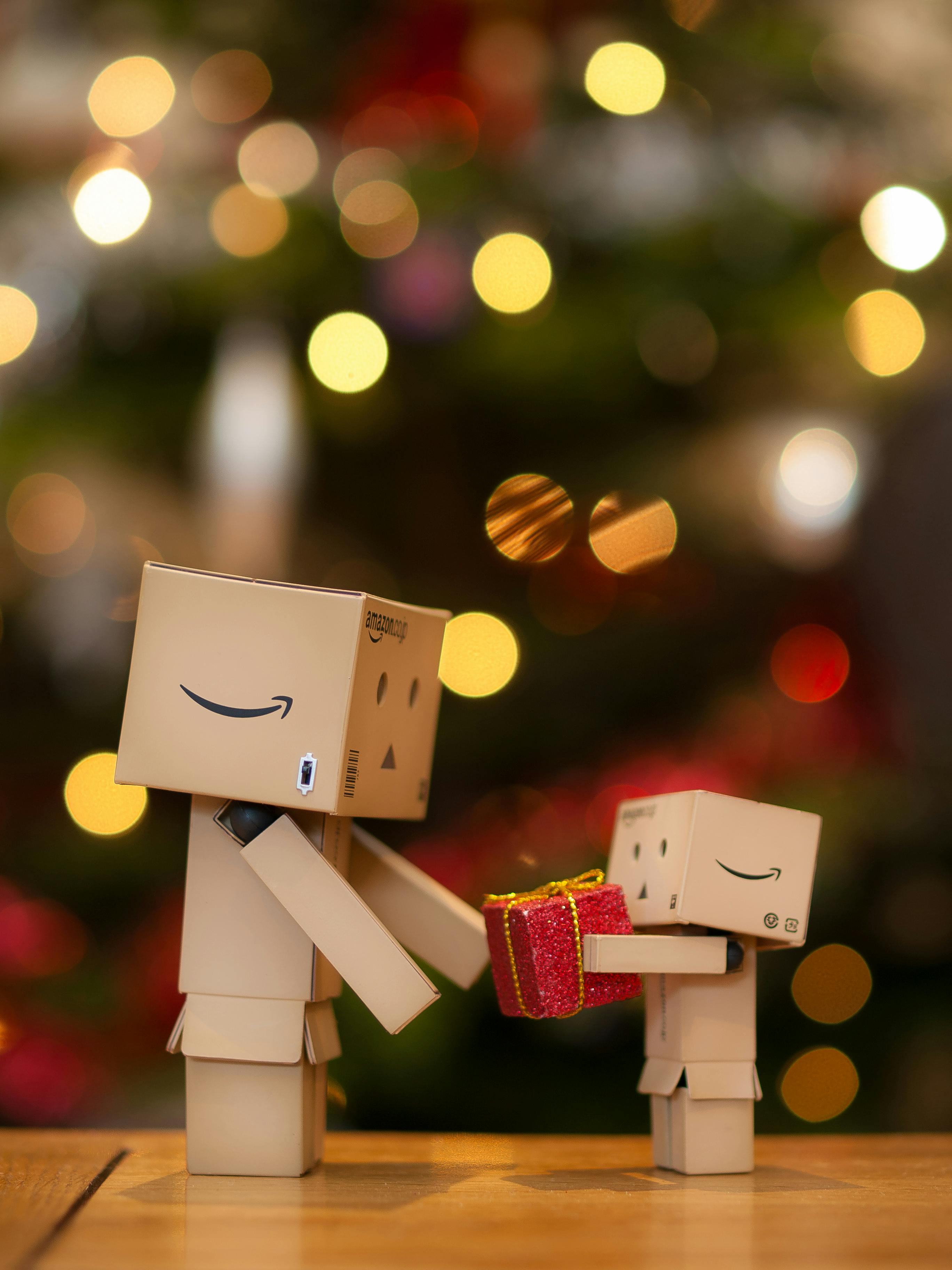 cardboard robots with christmas presents