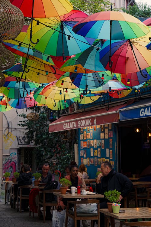 Bar with Multicoloured Umbrellas Hanging