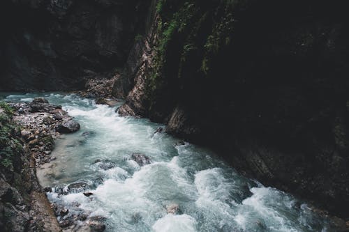 Body of Water Between Rock Formation