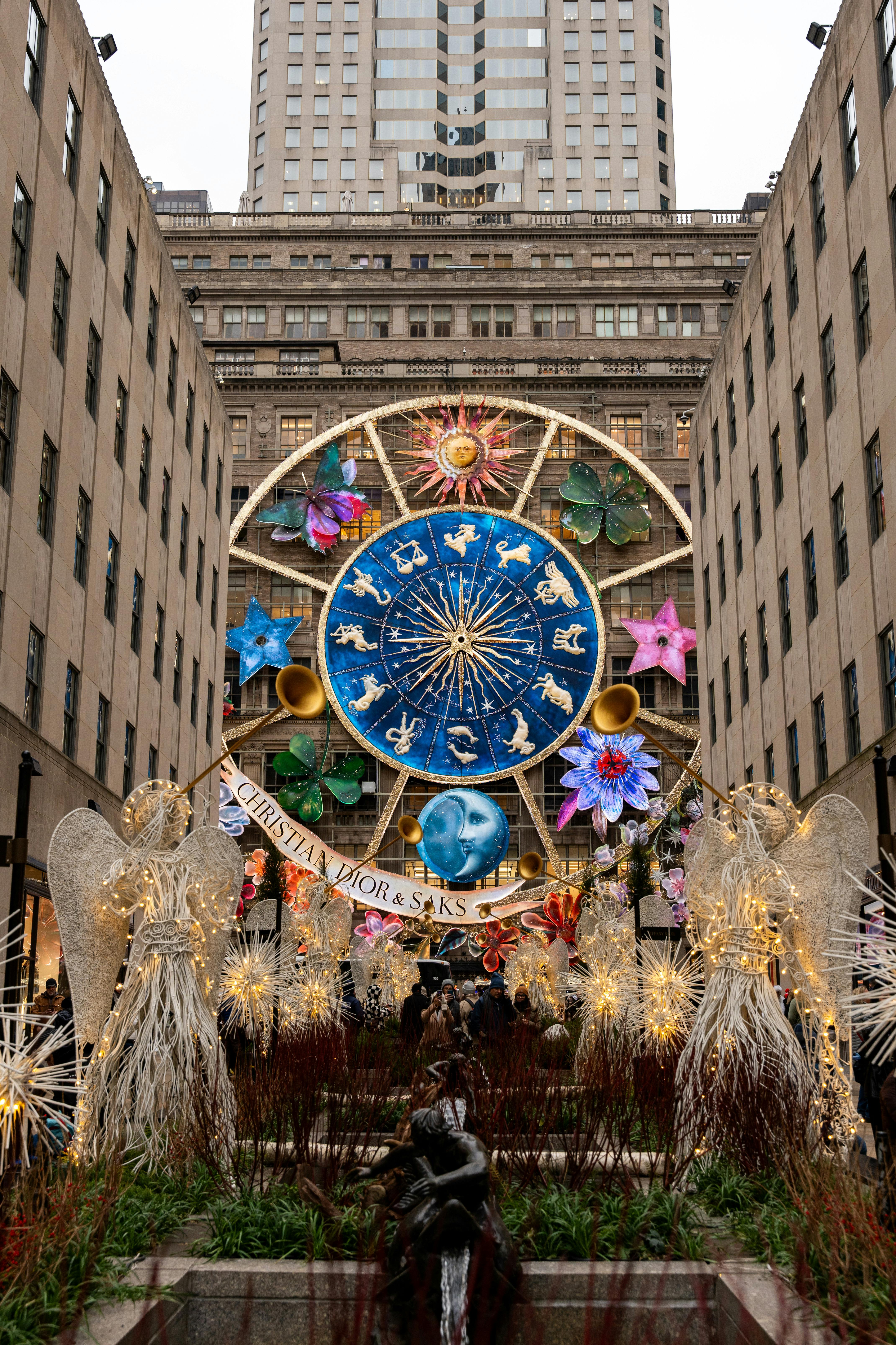 Free Vibrant holiday decorations featuring zodiac symbols at Rockefeller Center, New York City. Stock Photo