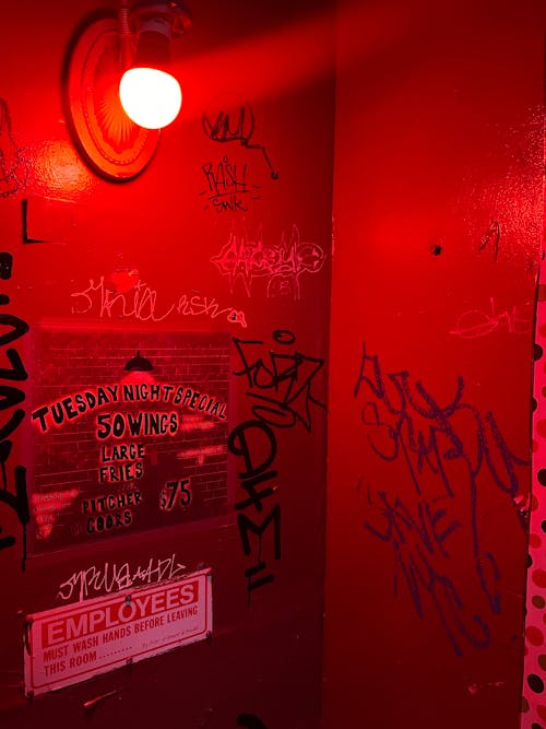 Graffiti in a Public Bathroom in Red Light 