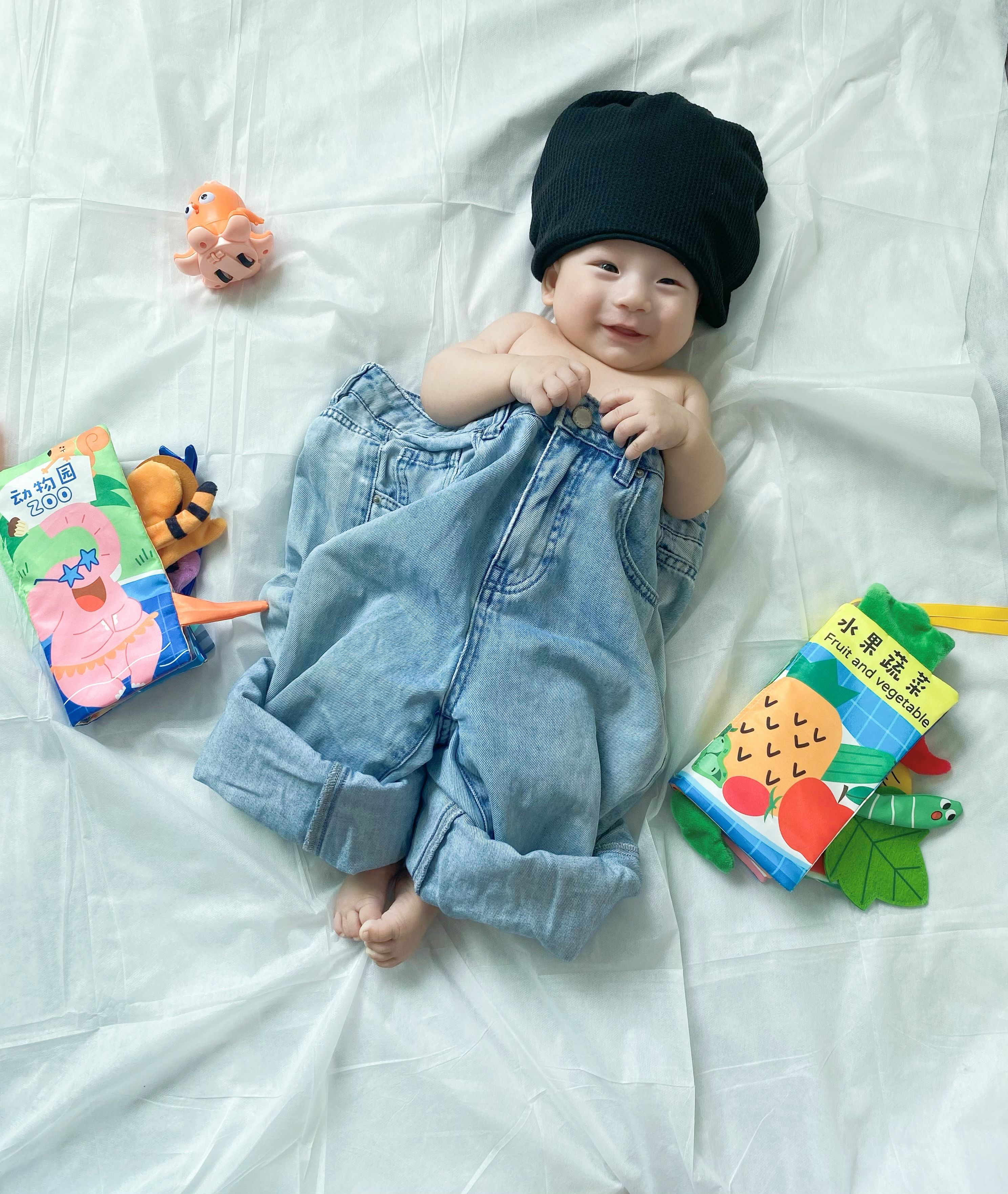 Baby Model in Hat and Jeans · Free Stock Photo