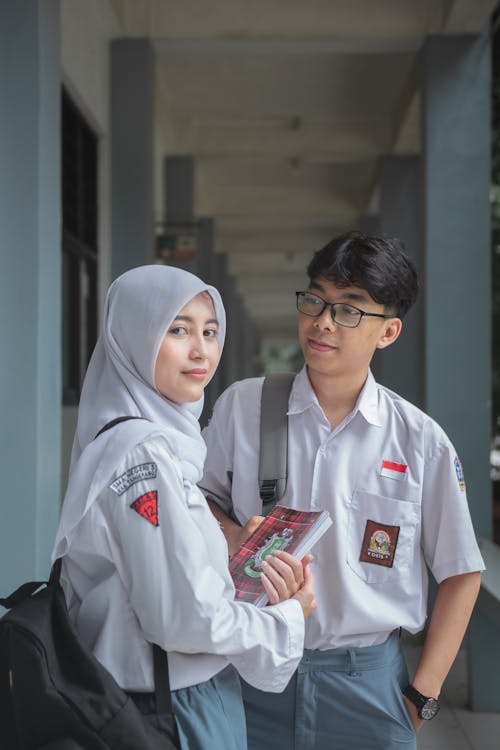 Couple of Teenage Students After School