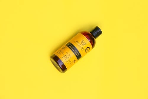 A Bottle on a Yellow Background