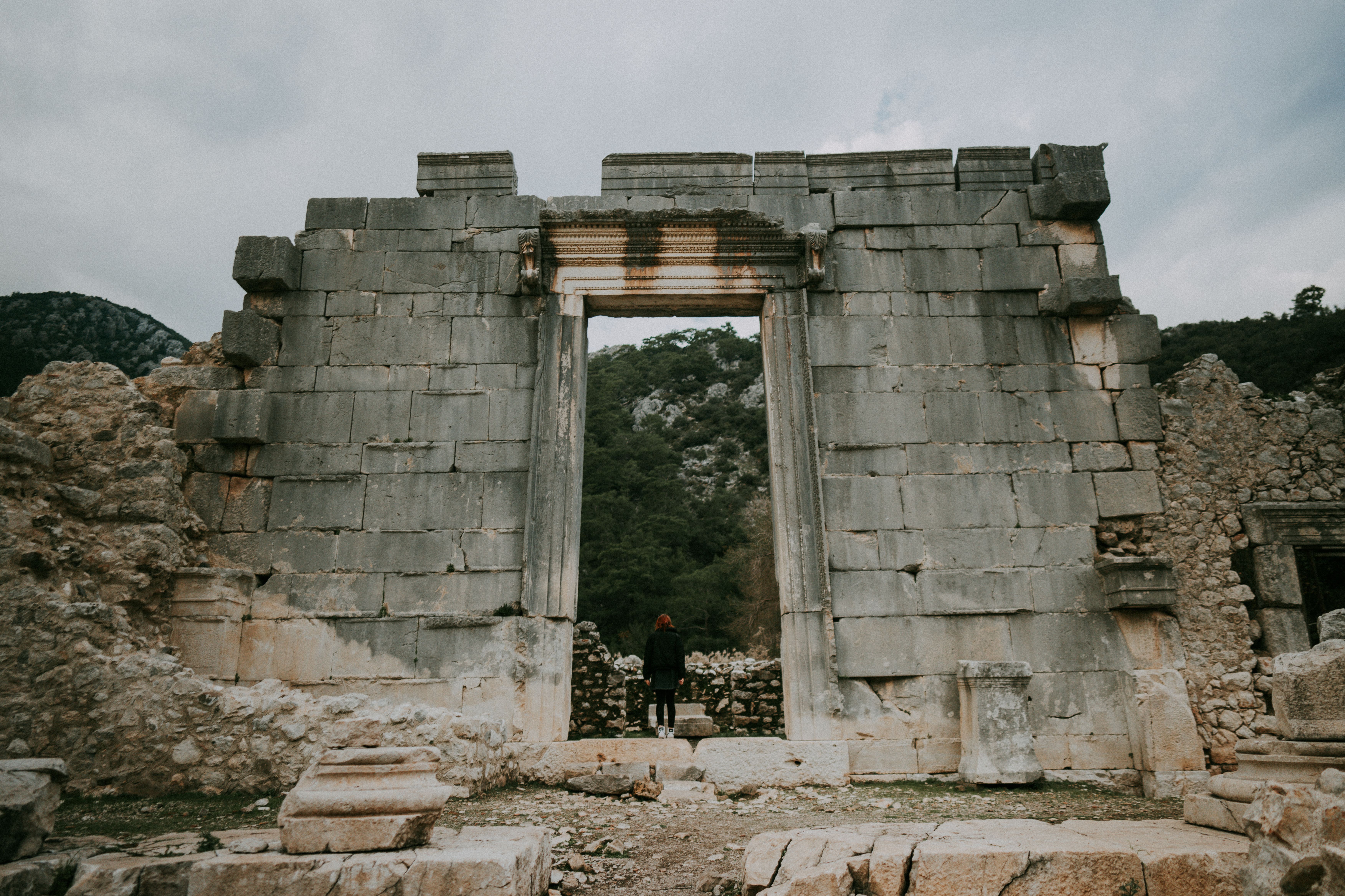 Discover the captivating ancient stone ruins at Olympos, Turkey, capturing history and architecture.