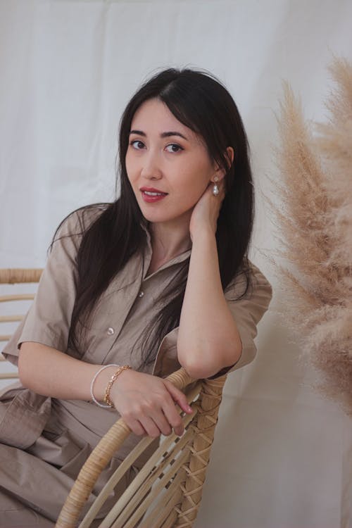 Elegant Woman Sitting on a Chair 