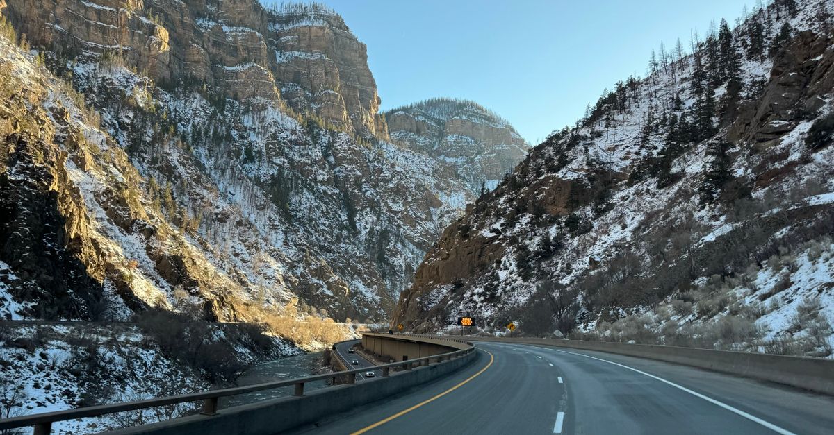 A breathtaking drive through snow-covered Glenwood Canyon, Colorado during winter.