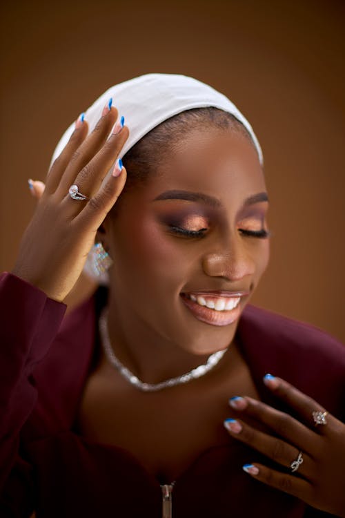 Pretty Woman in White Headscarf Smiling