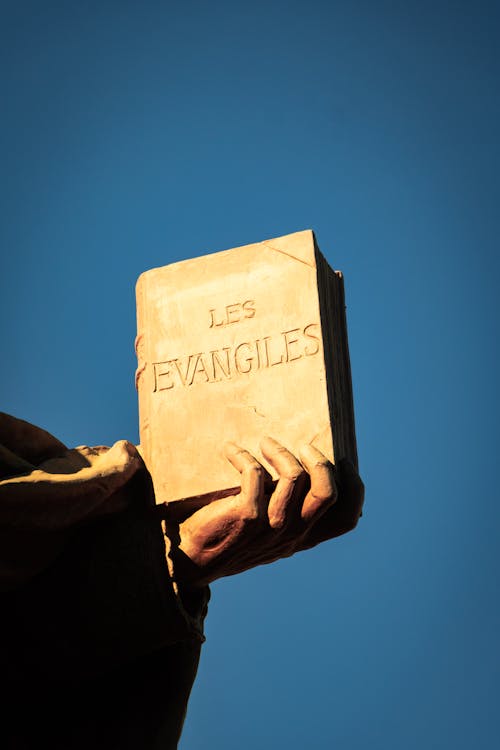Church Statue Book Evangiles