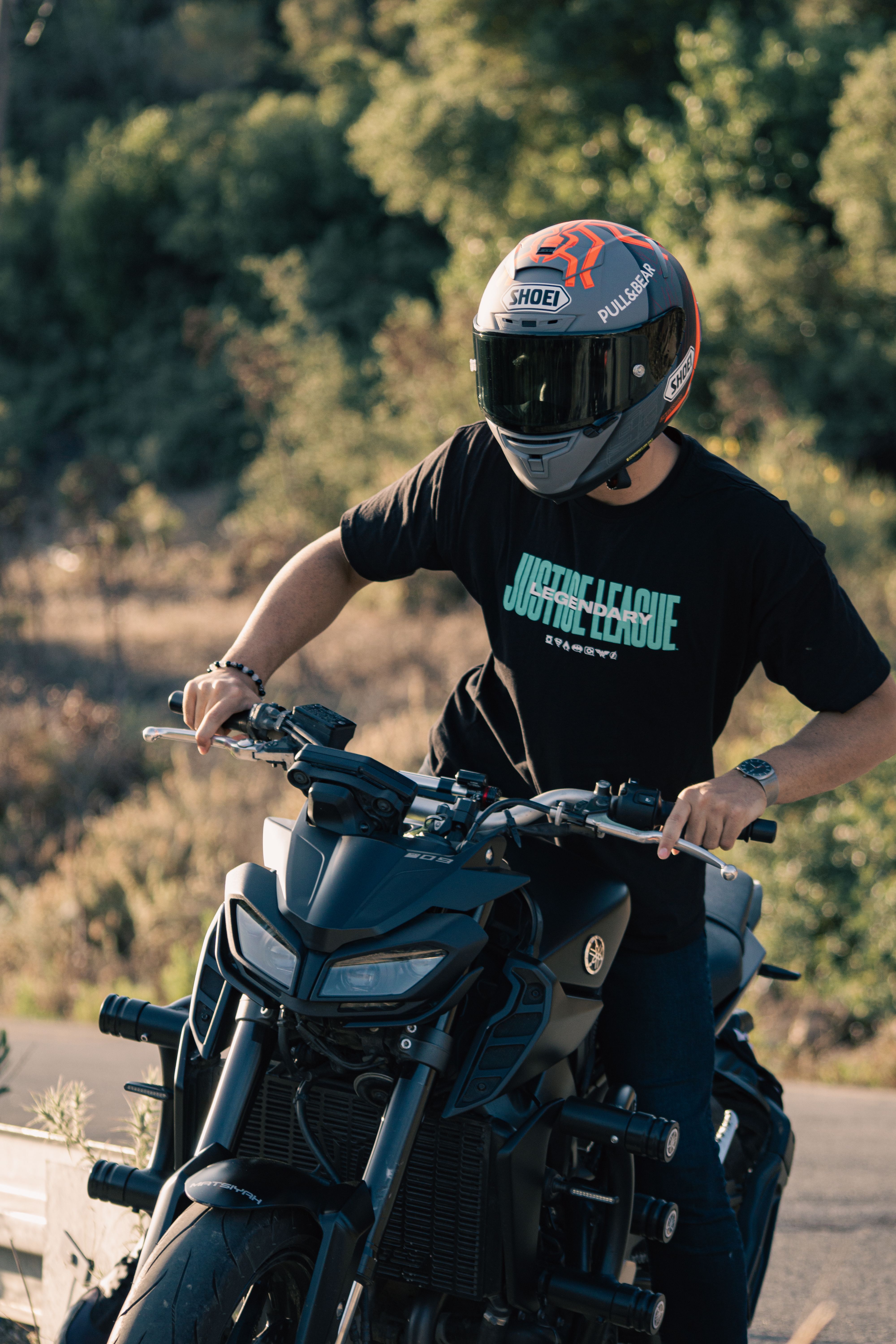 Man Sitting on a Black Yamaha MT Motorcycle · Free Stock Photo