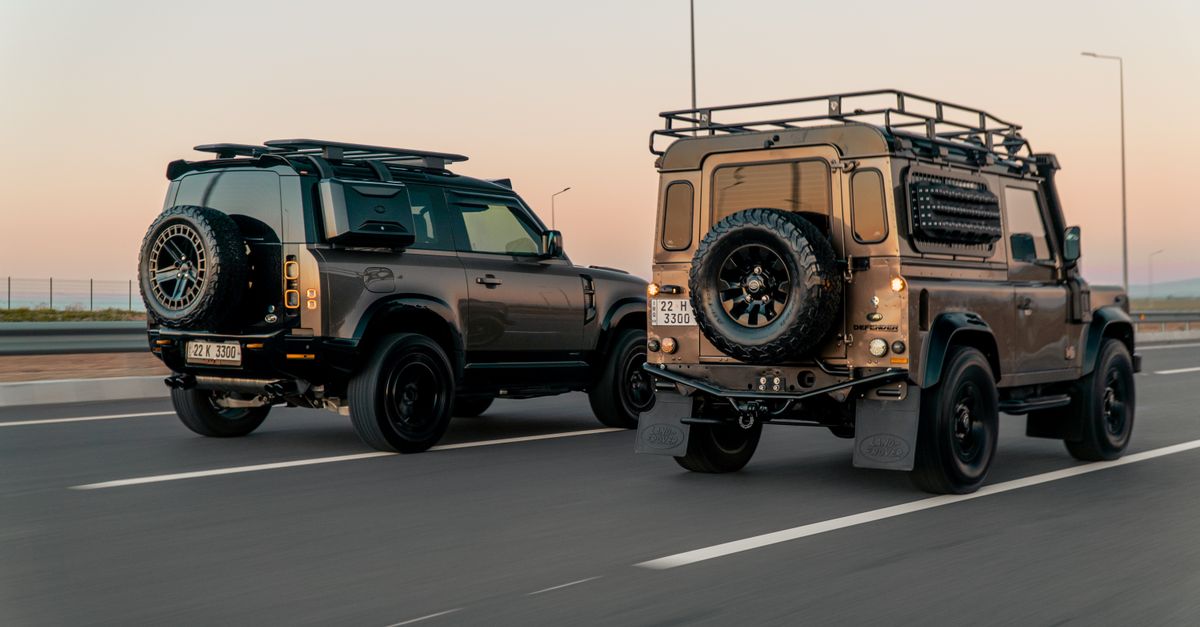 Download Land Rover Defender Land Rover Defenders on the Street · Free Stock Photo