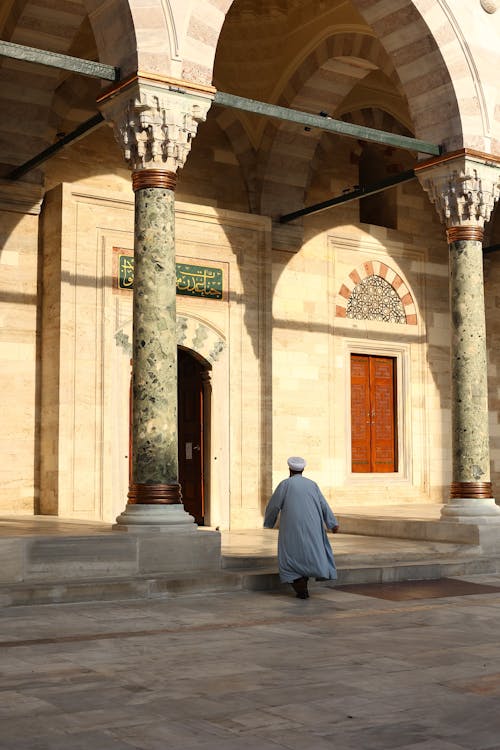 Back View of Man Entering Mosque