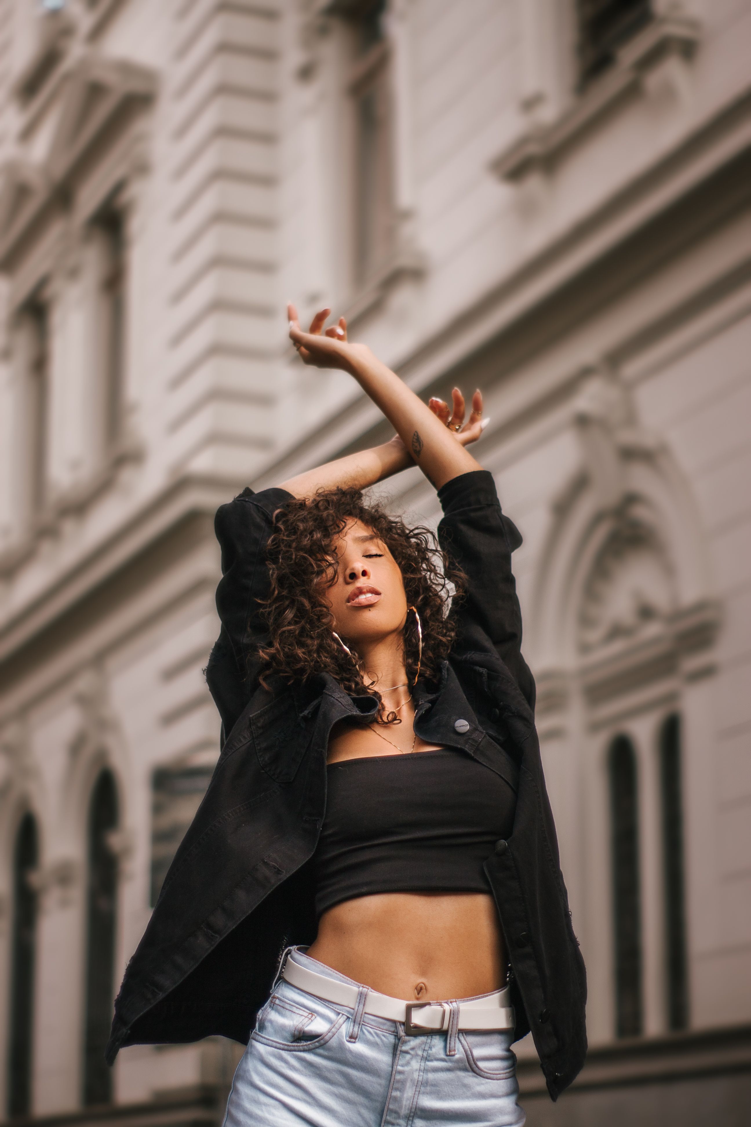 Woman In Black Jacket And Blue Denim Bottoms · Free Stock Photo