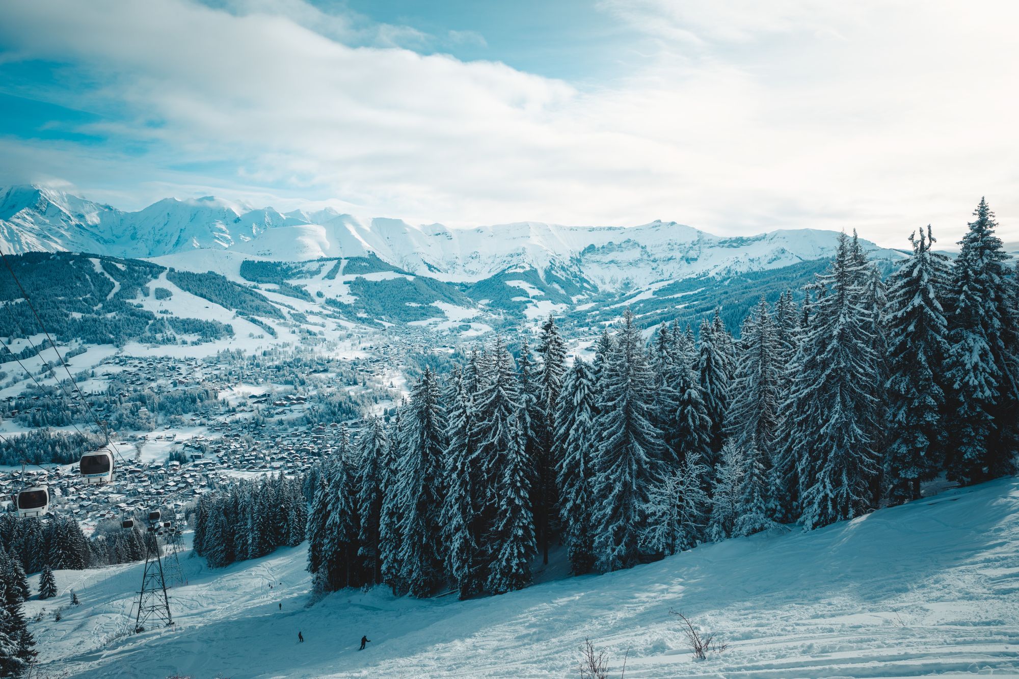 Snow-covered alpine slopes above Megève