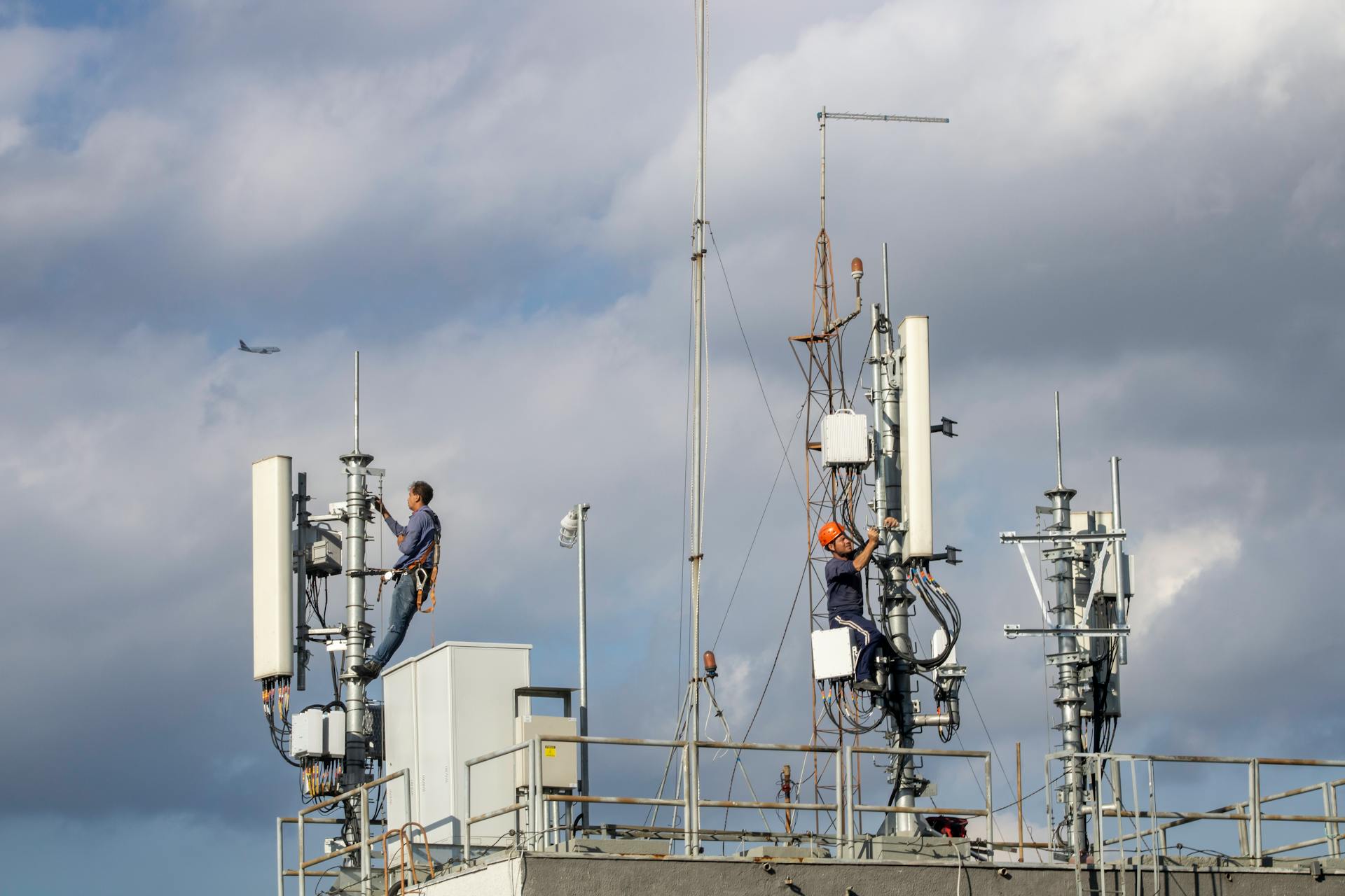 Workers Repairing a Cell Tower