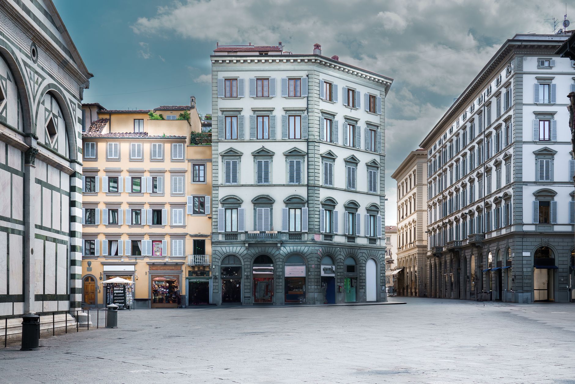 Elegant historical buildings in the heart of Florence, Italy with clear skies.