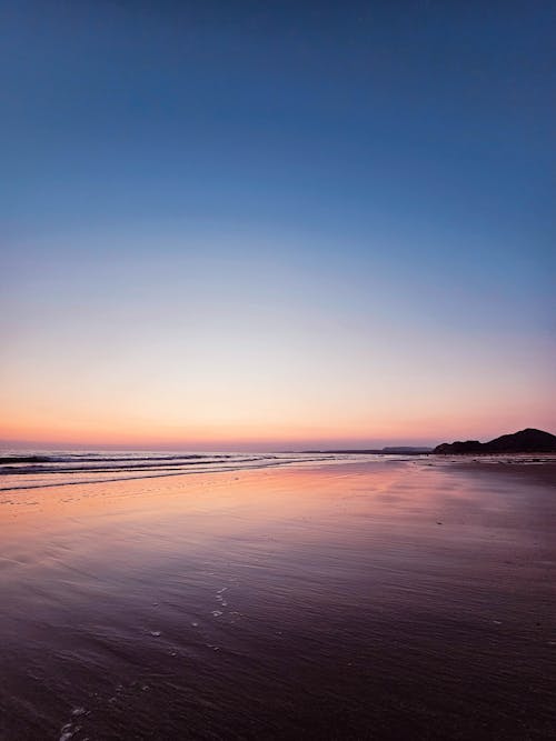 View of an Empty Beach at Sunset