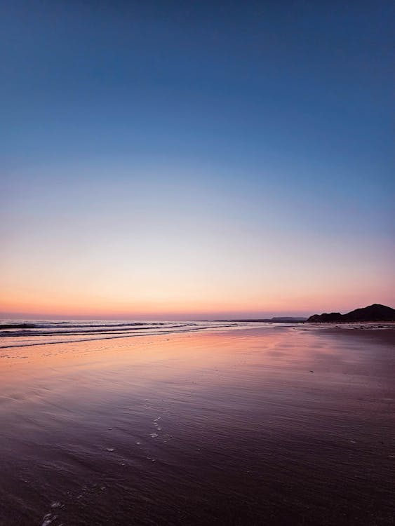 View of an Empty Beach at Sunset