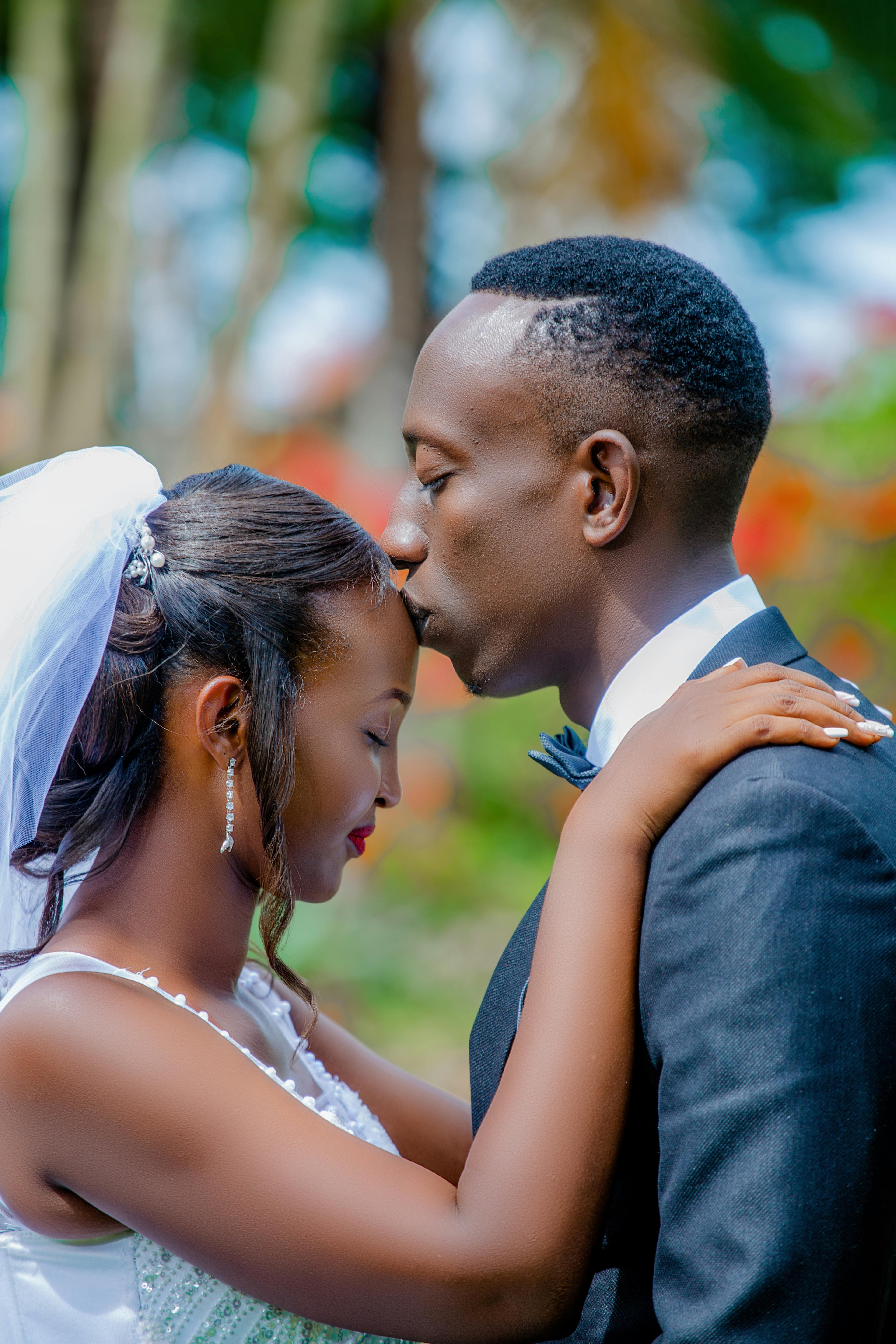 Husband Kissing His Wife · Free Stock Photo