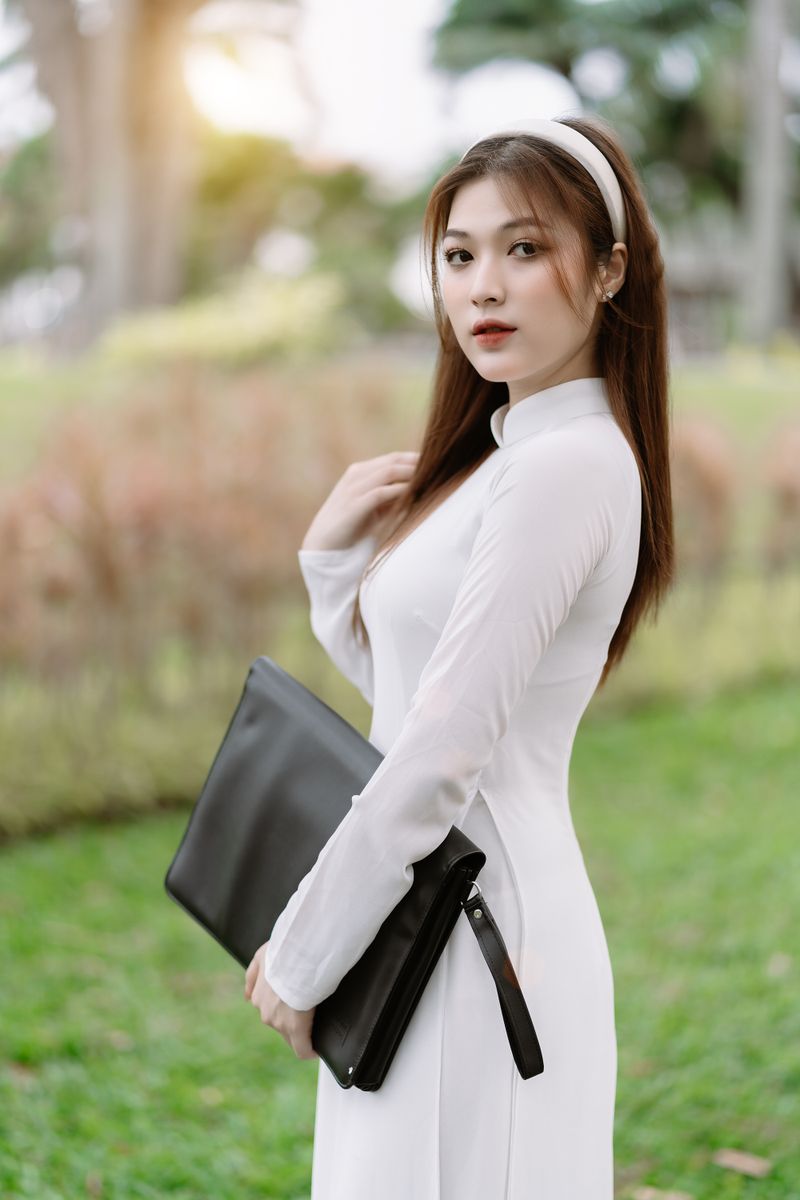 Woman in white dress, elegant portrait