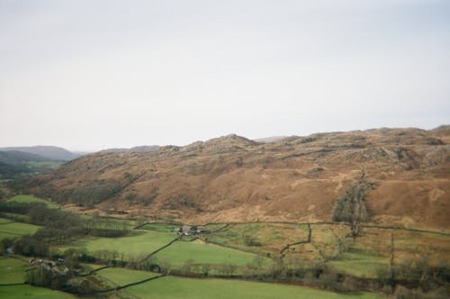 Foto profissional grátis de campo, cenário, colina