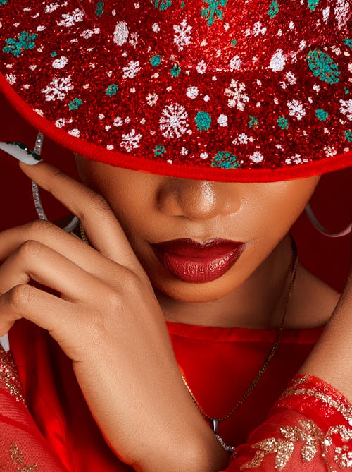Close up of Woman with Red Lipstick and in Red Hat
