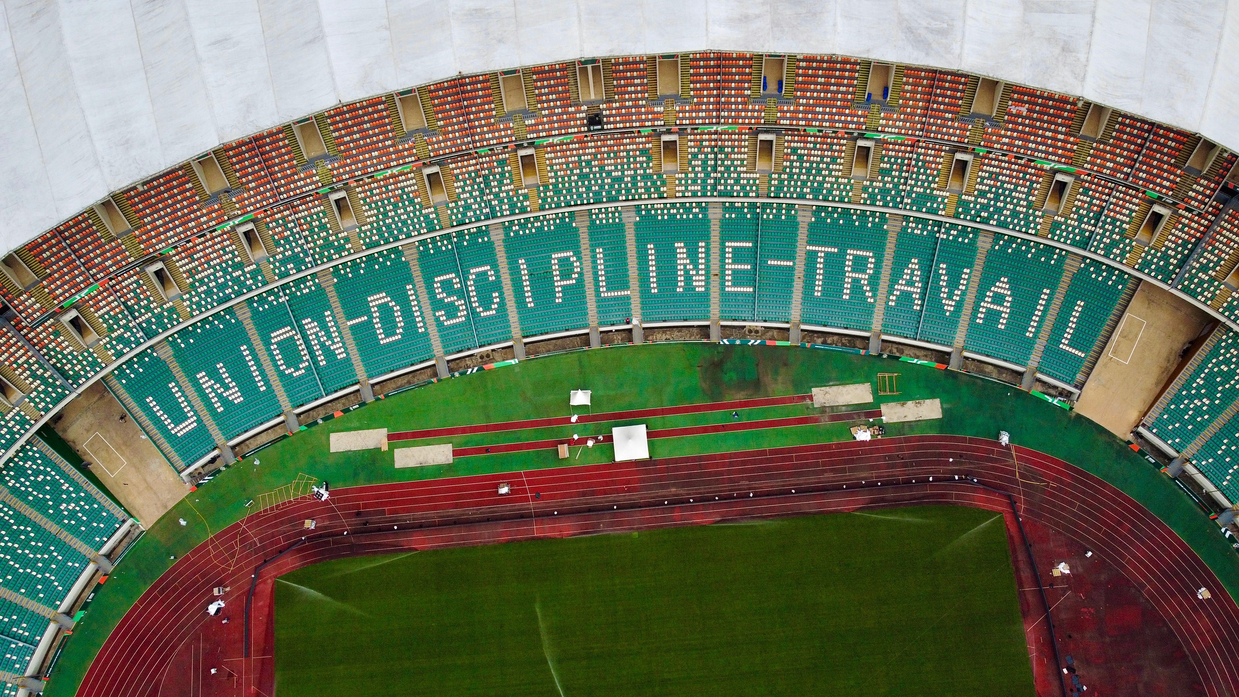 Aerial view of Alassane Ouattara Stadium in Côte d'Ivoire with empty grandstands.