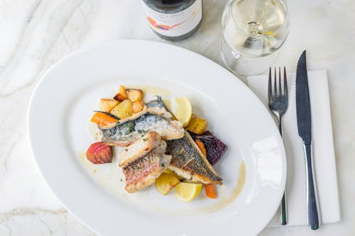 A Fish Dish and a Glass of White Wine 